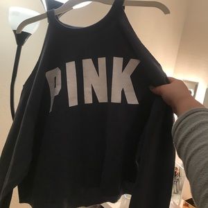 Pink crop sweater with slits at the shoulders